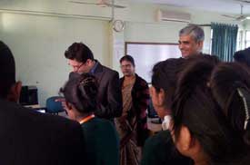 Students at the Grameen Caledonian College of Nursing, Dhaka curiously listening to Mr. Vivek Sawant and Mr. Amit Ranade.