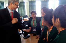 Students at the Grameen Caledonian College of Nursing, Dhaka curiously listening to Mr. Vivek Sawant and Mr. Amit Ranade.